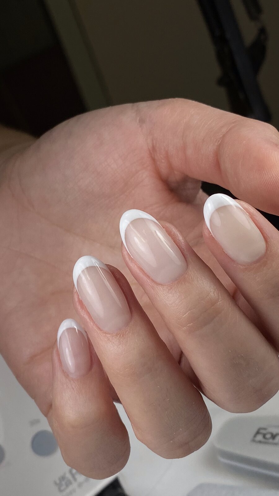 Thin almond French with white tips over the natural nail